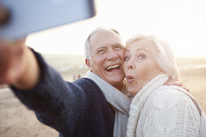 Smiling Couple Dentures - Marcos Ortega DDS Hillcrest San Diego