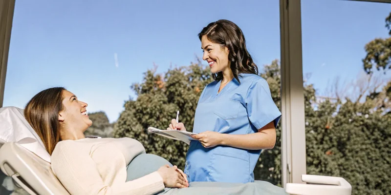 Expectant mother receiving a gentle dental checkup at a Hillcrest San Diego dental office